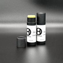 Olfactory House Chai lip balm comes in a cardboard tube with a  pull off lid. The balm is dispensed by pushed up on the bottom of the packaging. 