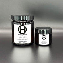 The Olfactory House Faire Taire Body Moisturizer comes in a 2oz or 9 oz glass jar with lid. 